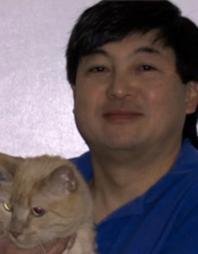 Terry Fujinami with tabby cat